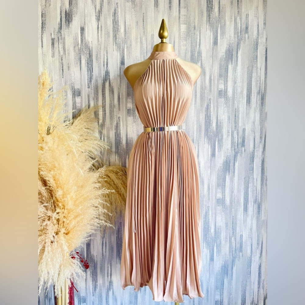 Beautiful cocktail dress, champagne colored in size medium. Worn once.